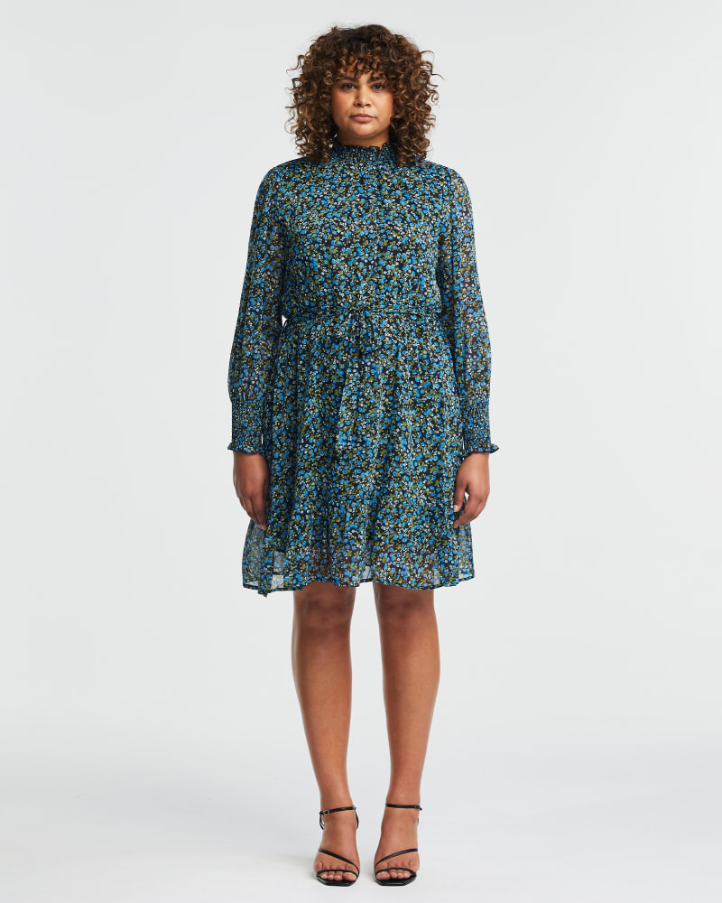 Front of a model wearing a size 24W Blue Iris Shirred Dress in Blue/Green by Estelle. | dia_product_style_image_id:323613